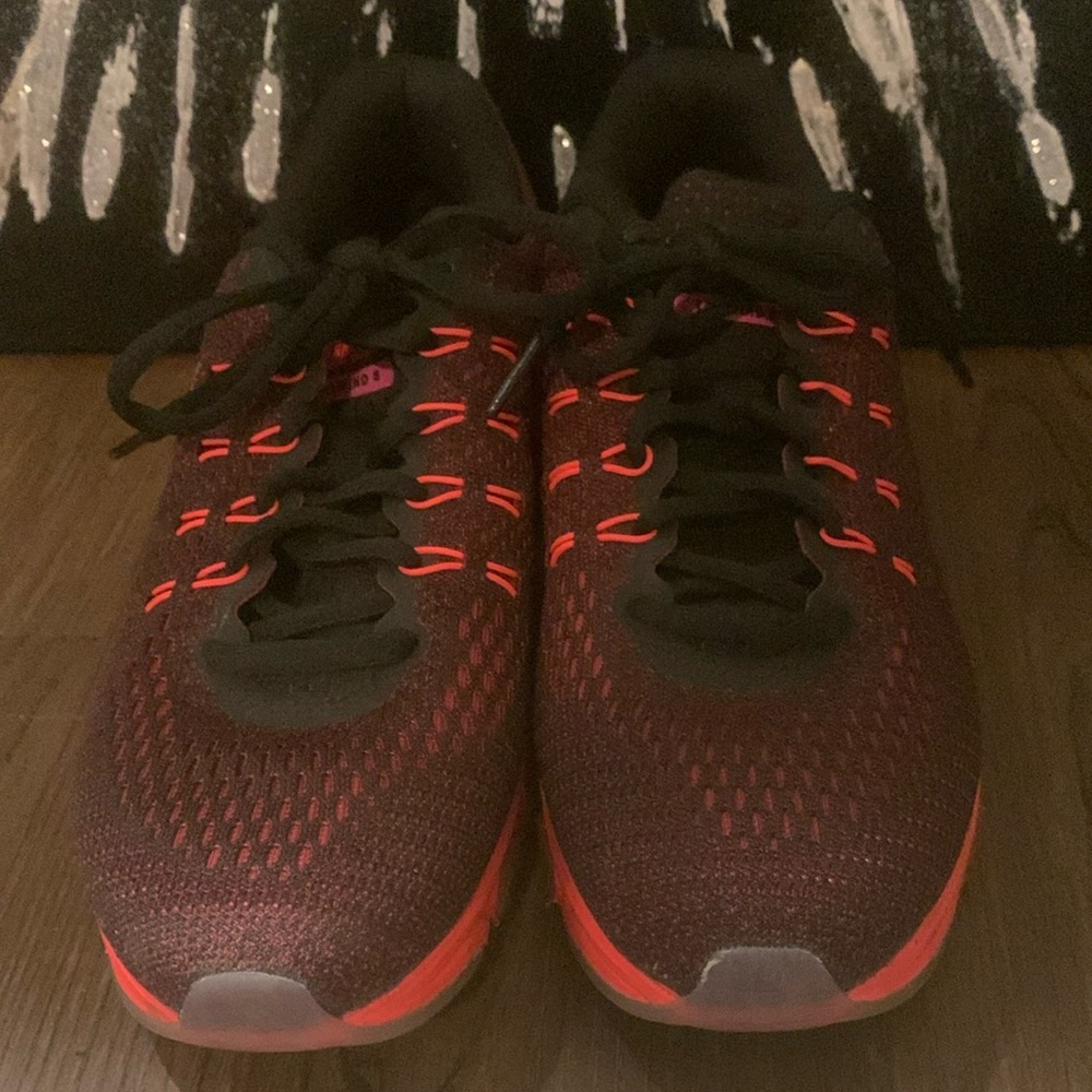 Nike Tailwind 8. Colors are black, red, and pink